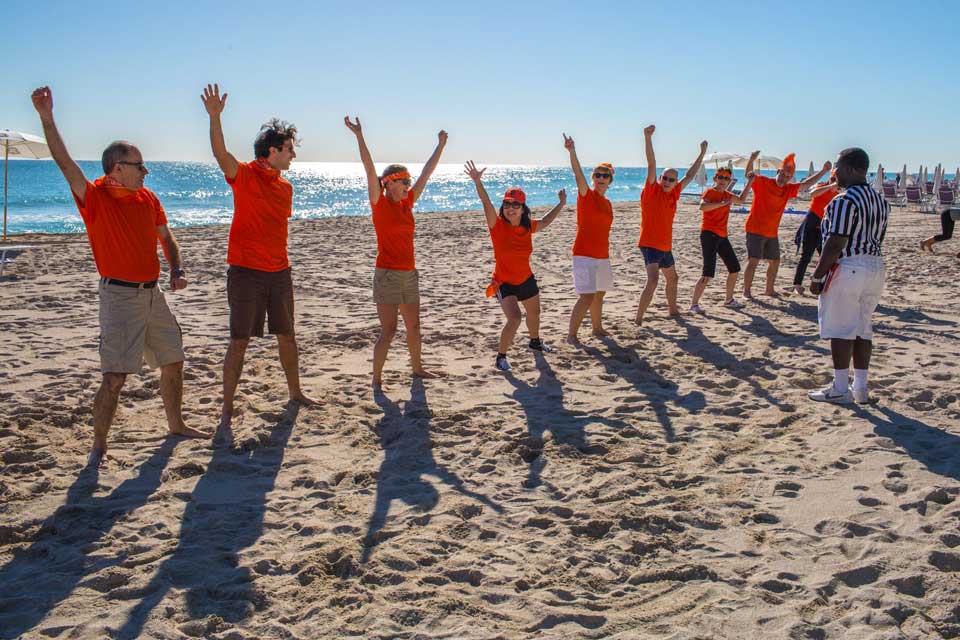 people team building on the beach