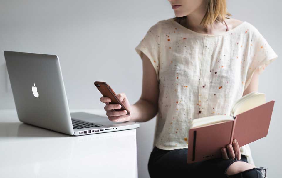 woman checking her phone