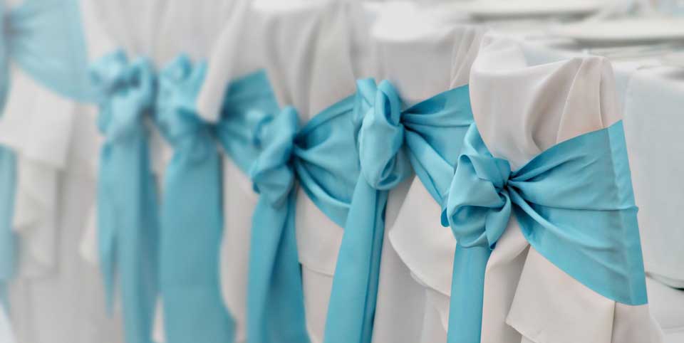 blue bow on chairs