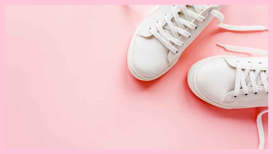 white shoes on pink background